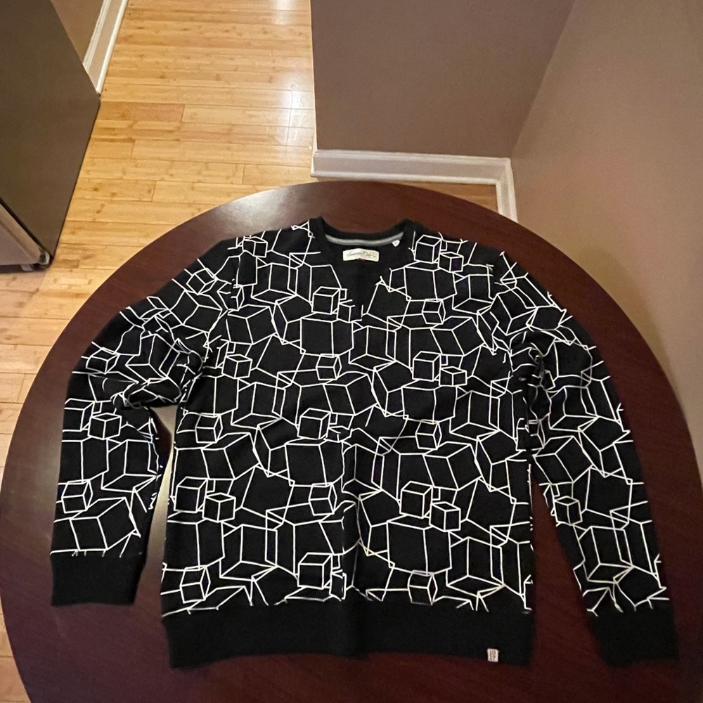Black with white squares crewneck sweatshirt.
